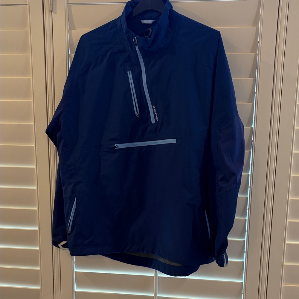 Zero restriction golf rain jacket.  With hood.